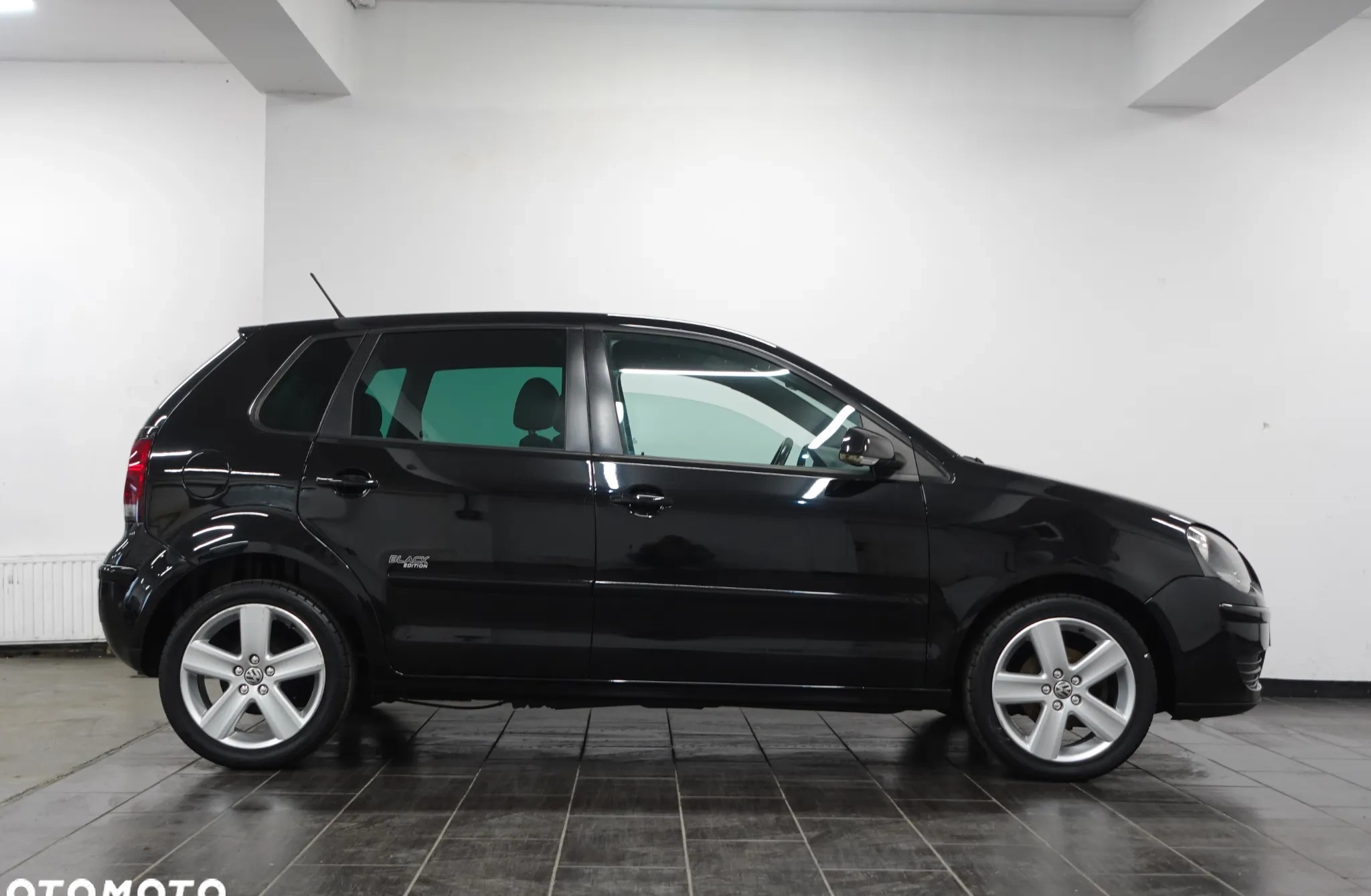 Volkswagen Polo cena 13900 przebieg: 197960, rok produkcji 2009 z Małogoszcz małe 667